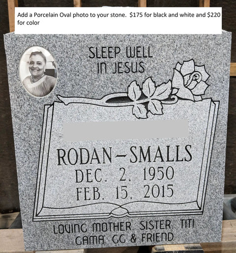 Granite headstone with engraved rose and personal photo, featuring dates, names, and a memorial message.