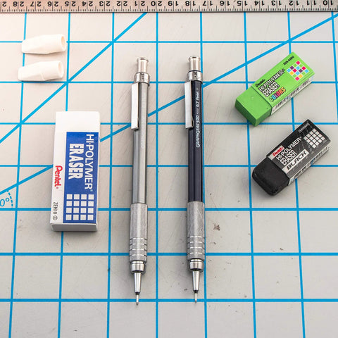 Graph Gear 500 Automatic Drafting Pencil 0.9mm with gray barrel and erasers on a grid background
