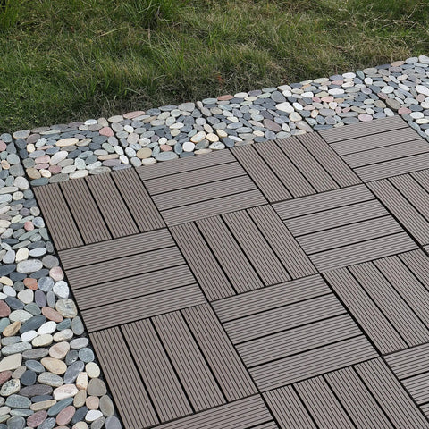 Interlocking Stone Deck Tiles 12x12 for Indoor Outdoor Use in Grey and White Real Pebble Slices on a pathway outdoors