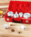 Front view of Milwaukee 28-piece hole saw kit in red carrying case with white hole saws