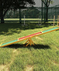 71 Inch Dog Agility Seesaw Pro Grade Solid Fir Wood Construction With Non Slip Surface And Adjustable Height in backyard setting