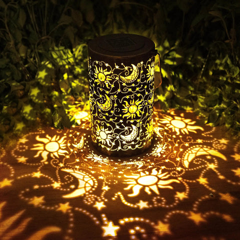 Outdoor Solar Lanterns For Garden Decor, brown metal lantern projecting sun moon star lights, on pathway