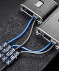 1/0 To 4 Gauge ANL Inline Fuse Block With Linkable Modular Design For Car And Marine Audio ANL Fuse Holder Built Beefy With Brass Construction And High Temp Housing For Ultimate Power Distribution installed with blue and black cables