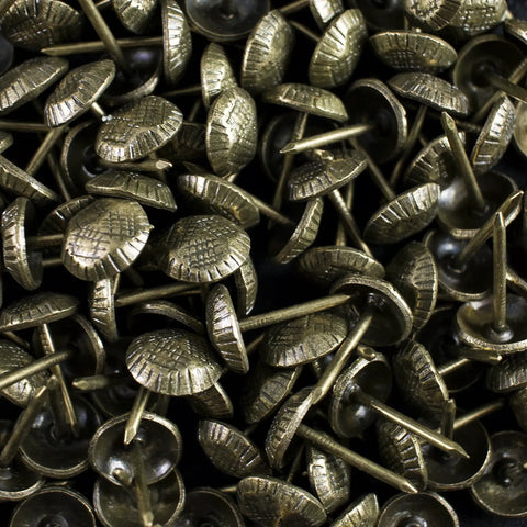 Top Shelf Antique Brass Upholstery Tacks, Hammered Furniture Nails For Couch Repair, 7 16 Inch, 100 Piece Bulk Box, No Fuss Diy Fix, Heavy Duty Hardware, Smooth As Silk stacked together, highlighting their brass finish.