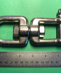 Marine Grade Stainless Steel 316 Anchor Swivel Featuring Heavy Duty Eye And Jaw One Half Inch Thick shown with ruler for size