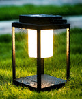 Rechargeable Outdoor Table Lantern With USB Port No Wires Needed, 350 Lumen Cordless Lamp, IP44 Waterproof on grass at night