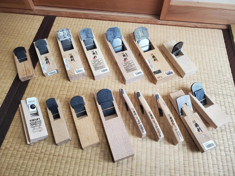 Various Japanese Block Plane 50mm For Woodworking, Kanna Smoothing Plane Hand Planer Tool For Finishing Wood displayed on a mat.