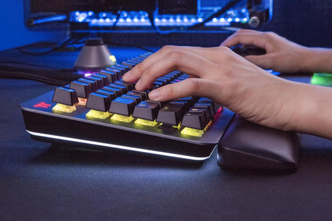 Premium Gaming Keyboard With Clicky Cherry Mx Blue Switches And Dope Rgb Backlighting showing hands typing on aluminum frame with wrist rest.