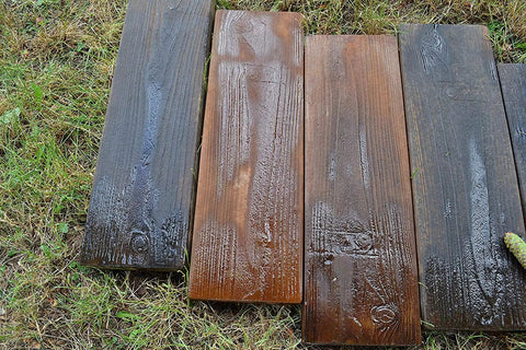 Two Piece Concrete Mold Set With Realistic Old Wood Look For Garden Stepping Stones Patio Pavers And Walkways displayed outdoors