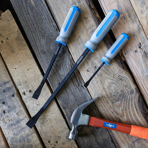 Three Piece Pry Bar Set With Angled Tips, 8, 12, 17.5 Inch Heavy Duty Crow Bars, displayed on wooden surface with hammer