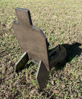 Back view of Beefy Three Eighths Inch Hardened Steel Shooting Target 7x12 IDPA Size with Metal Ground Stand on grass
