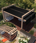 Wooden pergola with black privacy screens offering shade and shelter in a garden setting, with detailed insert of frame design.