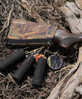 Adjustable Comb Raising Kit for Buttstock with Neoprene Sleeve and EVA Foam Cheek Pad in outdoor setting.