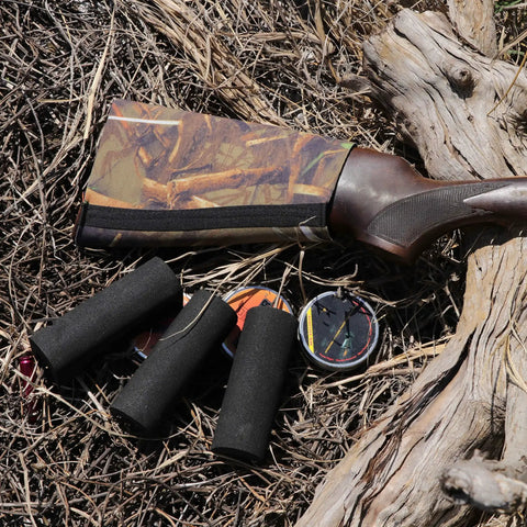 Adjustable Comb Raising Kit for Buttstock with Neoprene Sleeve and EVA Foam Cheek Pad in outdoor setting.