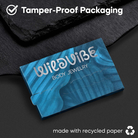 Tamper-proof packaging box for WildVibe body jewelry, in blue with a swirl design, made with recycled paper.