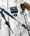Beefy High Torque Clock Movement Kit With Long Shaft And 12 Inch Spade Hands, Two Hooks Included, clock parts on wood surface