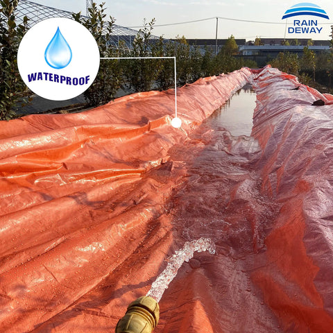 Heavy Duty Waterproof Poly Tarp Eight Mil Thick 10x100 Feet With UV Proof Shield as water pours on orange tarp