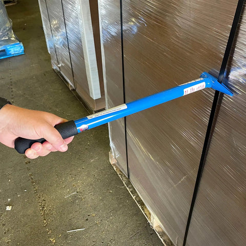 Rock N Snap Band Breaker 19 Inch Steel Strapping Tool being used on pallet for steel strapping, ideal for heavy duty breaks