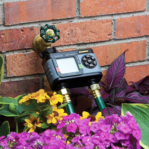 HydroLogic Digital Hose Timer Dual Zone Watering Controller Bundle With Quick Connect Two Independent Valves attached to brick wall