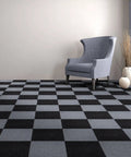 Self Adhesive 12 Inch Carpet Tile Pack With Peel And Stick Flooring For Kitchen, Dining Room, Bedrooms And Bathrooms In Smoke Grey, Easy DIY Installation shown in checkered pattern.