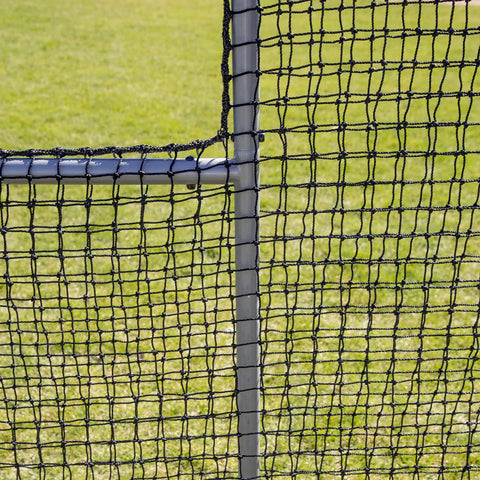 Close-up of 6Ft Black L Screen For Baseball And Softball Batting Practice With UV Treated Net And Steel Frame in a grassy field