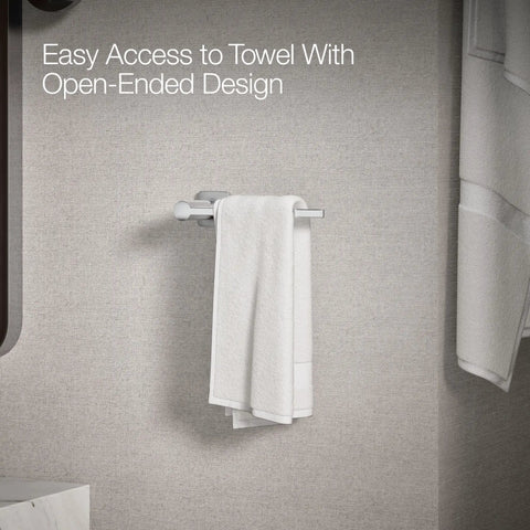 Parallel Towel Arm Bathroom Mount For Easy No Fuss Towel Access Wall Mount Towel Holder For Hand Towels Coordinating With The Parallel Collection Modern Chrome Finish Durable Steel Construction Simple Install Sleek And Functional with a towel hanging on it