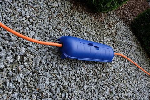 Outdoor IP44 Protected Power Box For 230V Extension Cables, Lockable Weatherproof Protective Case For H07RN-3G2.5 Cables, Blue, on gravel