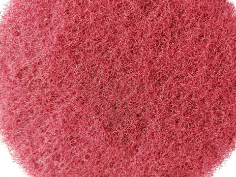 Close-up of red scrub pad from Drill Powered Tile Scrubber Kit With 4 Inch Disc Pad Holder And Six Scrub Pads, Two Stiffness Levels.