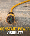 Close-up of 100 Foot Lighted Extension Cord With Click-To-Lock, LED indicators showing power and ground status on weatherproof cable.