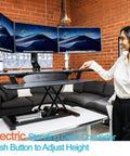 PowerPro 36 Inch Electric Standing Desk Converter For Sit To Stand With Height Adjustable Riser in office setting