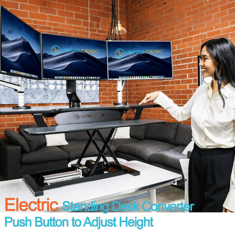 PowerPro 36 Inch Electric Standing Desk Converter For Sit To Stand With Height Adjustable Riser in office setting
