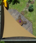 Top view of Keepin It Cool Under The Sun Sand Beige 10x10x14 Ft Triangle Shade Sail Canopy installed over a patio.