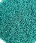 Close-up of green scrub pad from Drill Powered Tile Scrubber Kit With 4 Inch Disc Pad Holder And Six Scrub Pads, Two Stiffness Levels.