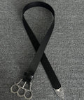 Adjustable Gothic Industrial Belt With Heavy Duty Engraved Knuckle Metal Buckle For Men And Women Punk Rock Fashion Strap To Flex Your Drip On Jeans Daily on gray fabric