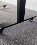 Standing desk base with 2 Inch M8 Threaded PU Swivel Casters Set Of 4 With Brakes for mobility on a carpeted floor