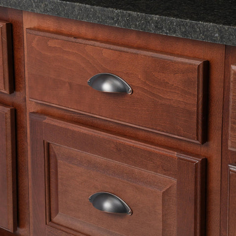 Oil-Rubbed Bronze Cup Pull 2-1/2 Inch Center To Center 4-1/16 Inch Overall Length installed on wood cabinet