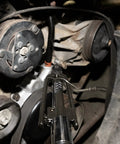 Heavy Duty Safety Wire Pliers With Reversible Twist Action for Cars Machinery and Aircraft, gripping wire in engine setup
