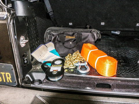 Universal Winch Accessory Kit with Tree Trunk Protector 4x20 Feet, Snatch Block 30,000 Lb Capacity, gloves, and trail bag in car trunk
