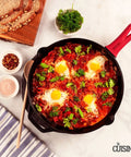 12 Inch Cast Iron Skillet With Glass Lid And Silicone Handle for Easy Grabbing Preseasoned And Oven Safe PFAS And PFOA Free Indoor Outdoor Cooking Pan with breakfast shakshuka