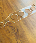 Ultra Clear Acrylic Flight Paddle Template For Woodworking Router Jigs And Home Bar Trays on wooden surface.