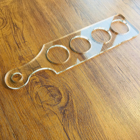 Ultra Clear Acrylic Flight Paddle Template For Woodworking Router Jigs And Home Bar Trays on wooden surface.