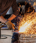 Man welding with HydraHyde Leather Work Gloves For Ranching, Fencing And Construction, Water Resistant Split Cowhide, Reinforced Palm