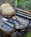 Ferro Rod Fire Starter Kit With A Large One Half Inch Rod, Fire Tinder And Custom Carry Pouch, all displayed on a tree stump.