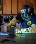 Heavy Duty Eighteen Inch Kevlar Arm Sleeves Featuring Legit A3 Cut Resistant Armor and Heat Proof Double Layer Weave, worn during welding.