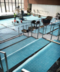 Aqua Shield Surface Protector 10 Mil 36 Inch By 100 Foot Heavy Duty Protective Film covering construction floor area indoors.