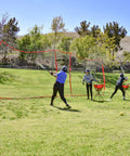 Portable Sports Barrier Net Great For Baseball Softball Lacrosse Tennis Football And More Two Size Options 12 Ft By 9 Ft Or 20 Ft By 10 Ft Includes Carry Bag Perfect Backyard Practice Net For Any Ball Over 2.5 Inches In Diameter with players practicing baseball in a backyard.