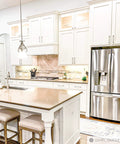 Modern kitchen with white cabinets featuring Milano Door And Drawer Pull 8 Inch Center-To-Center In Oil Rubbed Bronze.