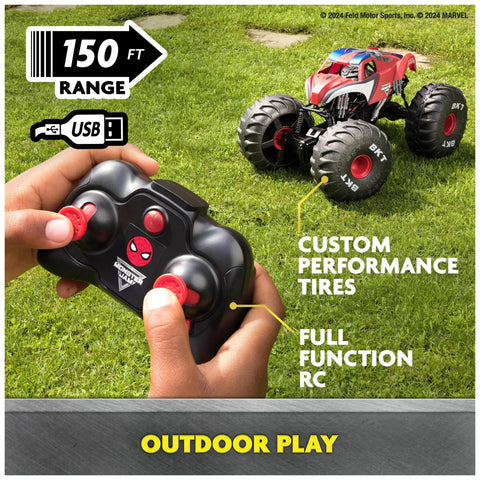 Remote control being used with Spider Man RC Monster Truck Mega Size Over Two Feet Long One Six Scale All Terrain Off Road Toy