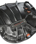 Hella Tough Nodular Iron Differential Cover For Ford 9.75 Rear Axle showing textured surface and drain plug fittings.