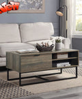 Heavy Duty Farmhouse Coffee Table With Storage Door And Two Open Shelves Industrial Rustic Cocktail Center Table For Living Room featuring a wooden top and metal legs.